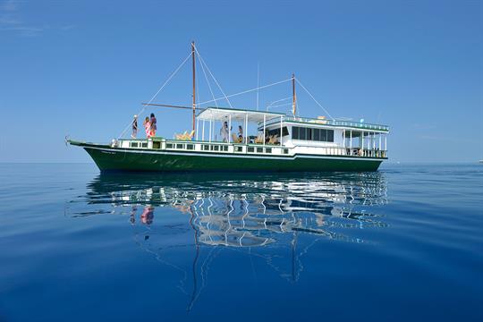 The Gahaa dhoni adventure cruise takes guests through the atolls of the Maldives